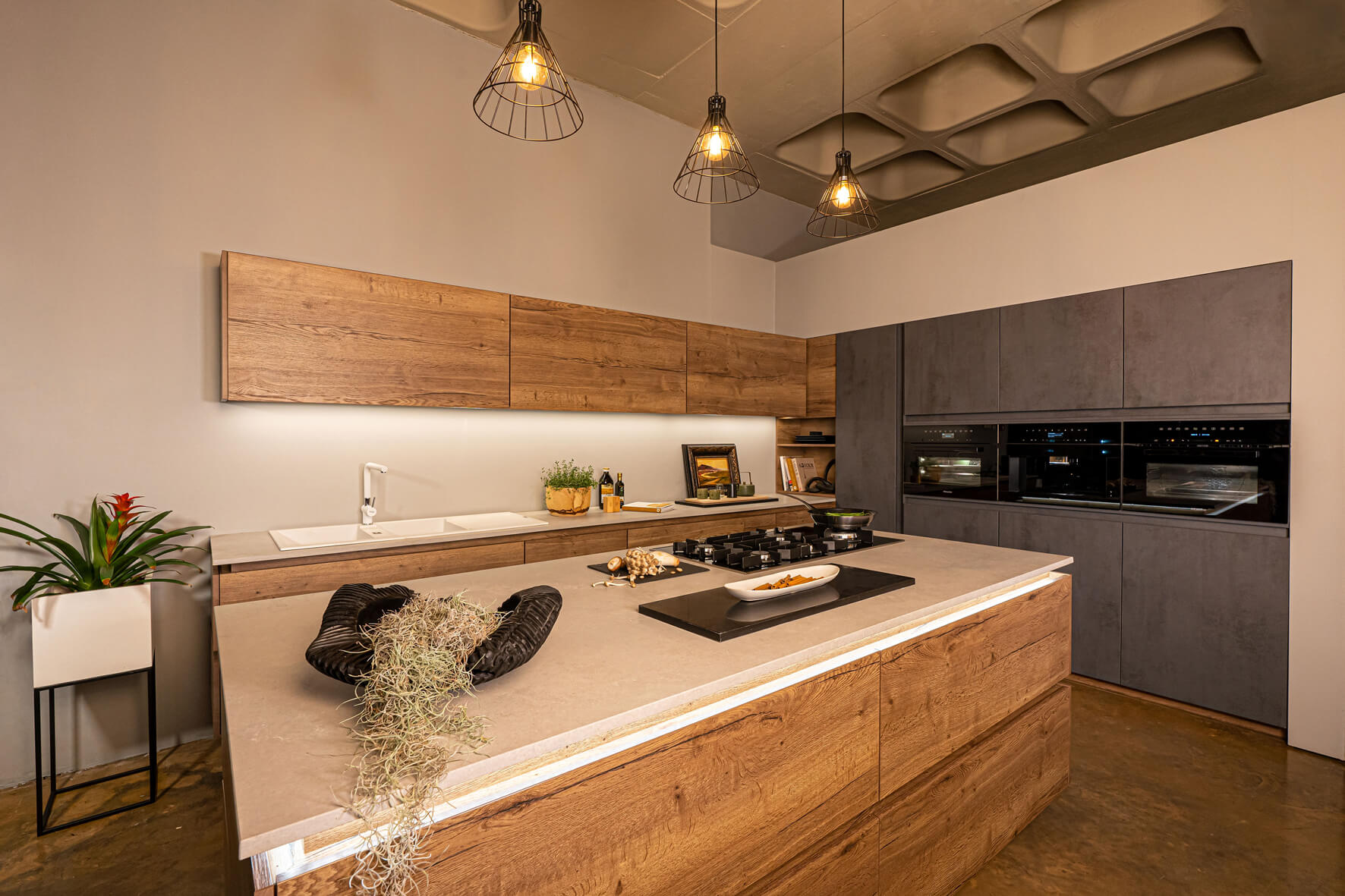 HUS Inspirations - kitchen design with Feelwood Tobacco cabinets and Airy Concrete countertop.